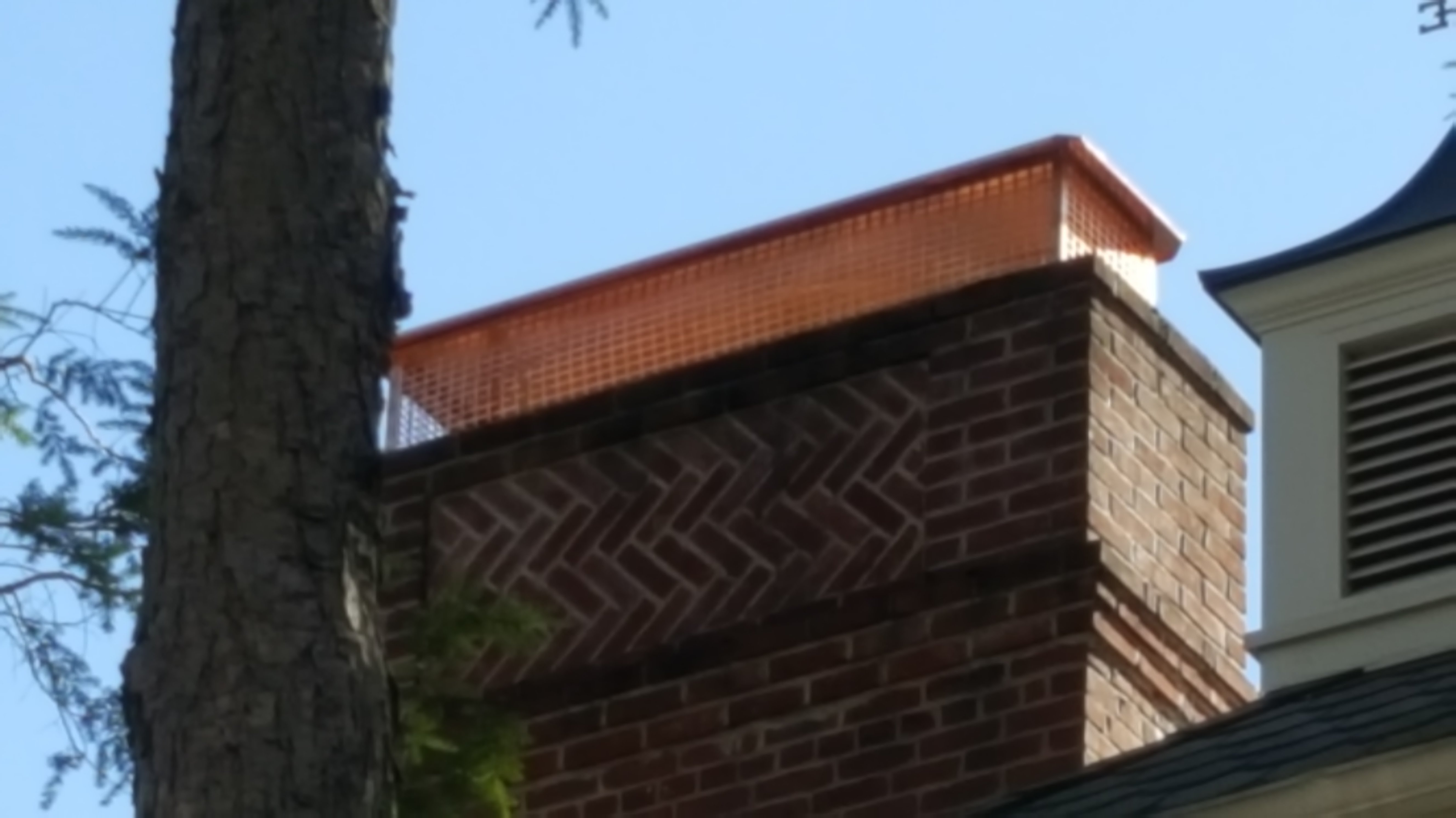 New stainless steel chimney cap installed in Syosset, NY