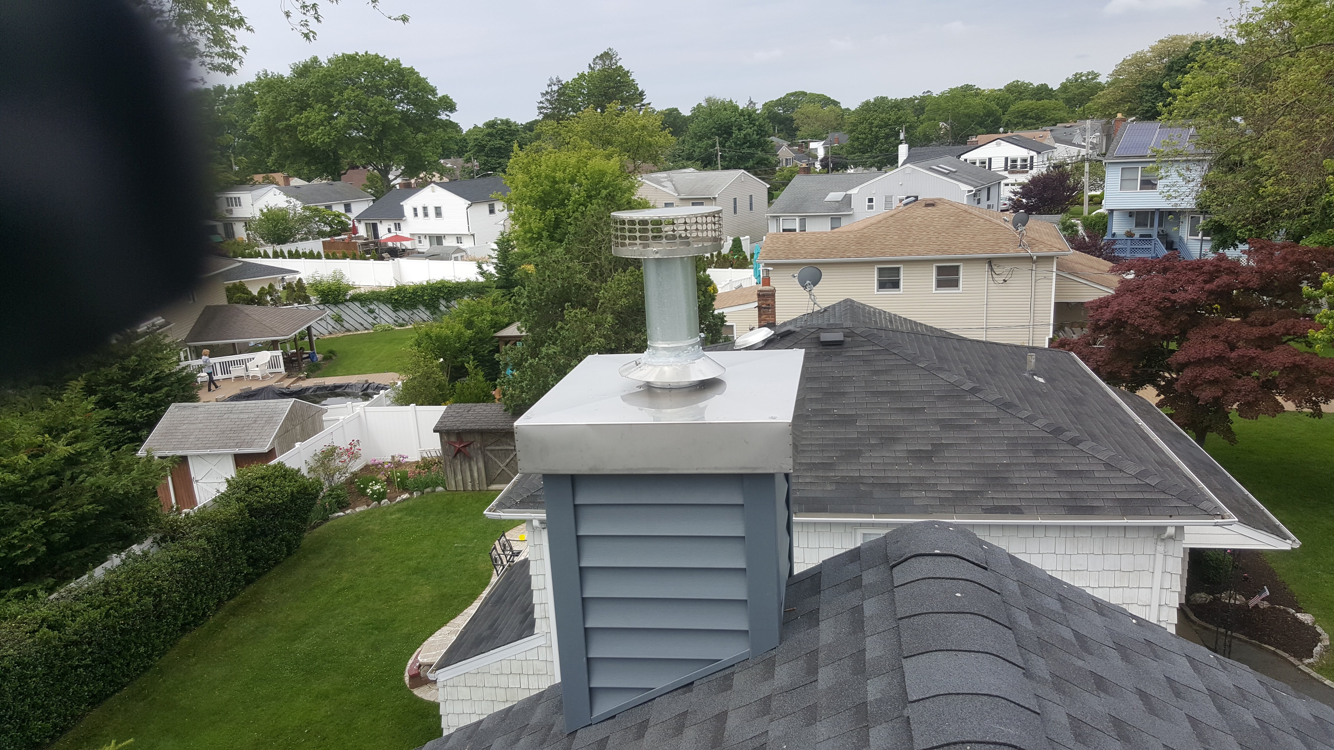 Complete chimney crown rebuild and waterproofing in Syosset, New York