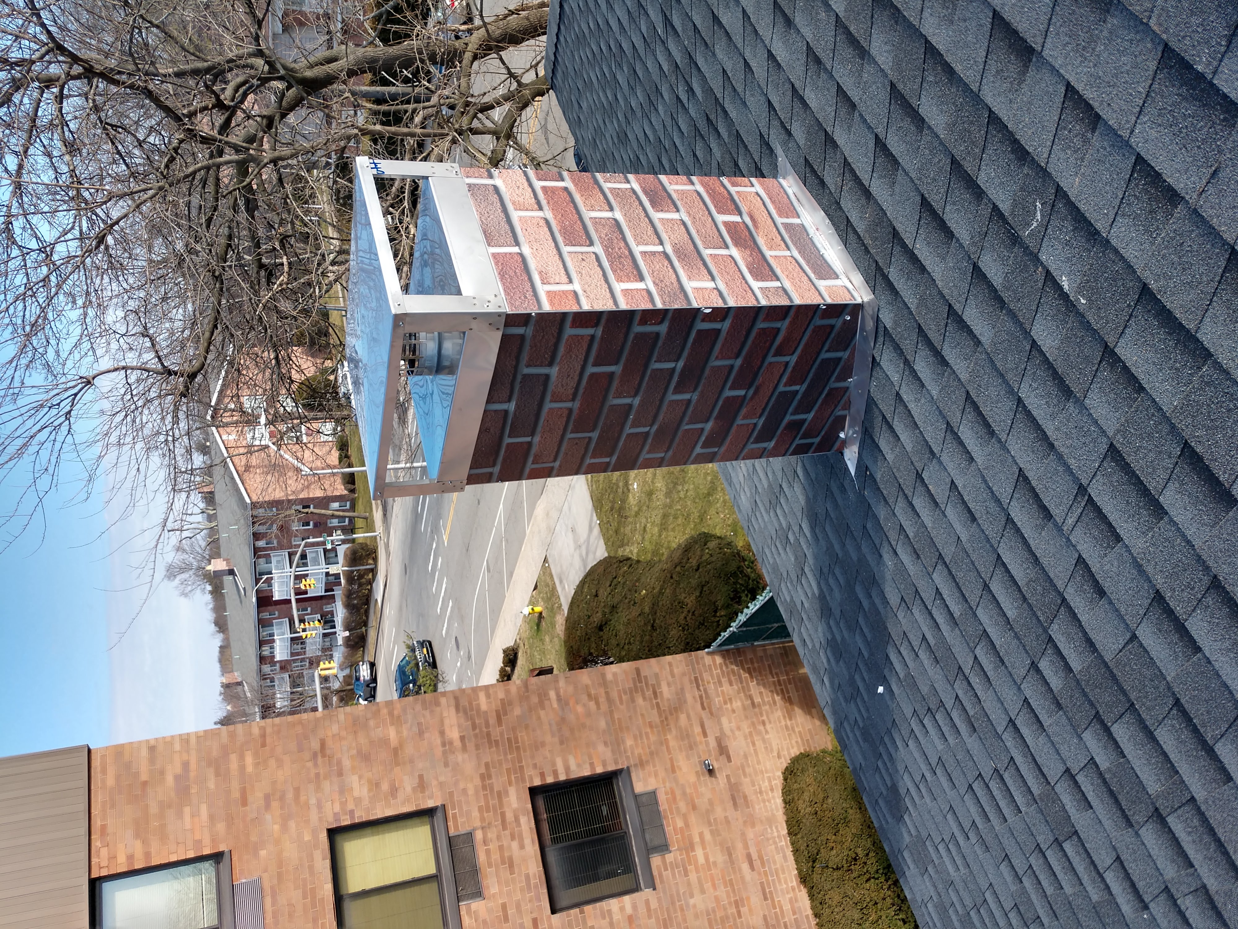 New elastomeric sealant applied to chimney crown in Syosset, NY